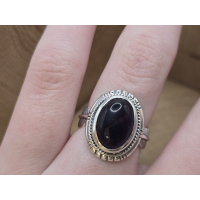 Echt zilveren ring met veer band en amethist steen